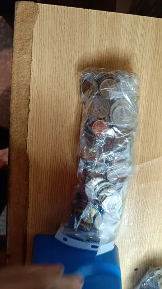 2 Kilos de monedas extranjeras/mundiales