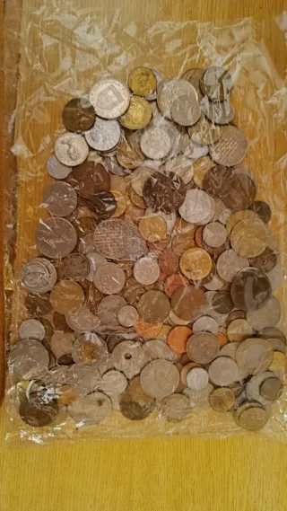 2 Kilos de monedas extranjeras/mundiales