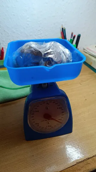 2 Kilos de monedas extranjeras/mundiales