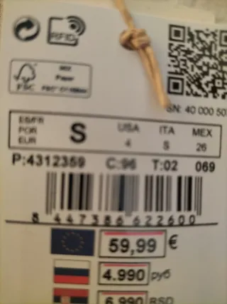 Camisa blanca de manga larga.Vale para talla S / M