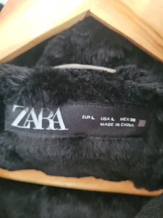 Cazadora Zara plumifero gris con cinturón