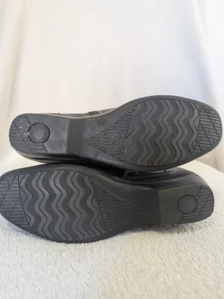 Botas de cuero negras para mujer