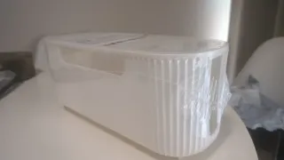 Caja organizadora de enchufes y cables