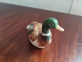 Payasos loza fina y regalo pato