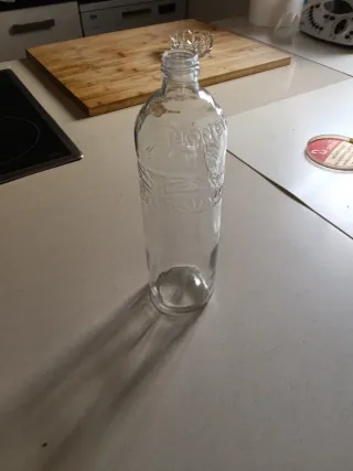 Botellas de cristal decorativas