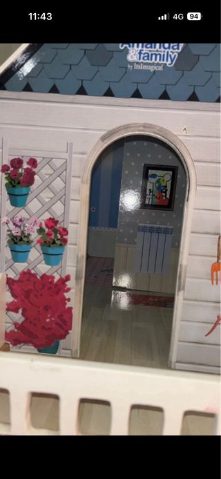 Casita de muñecas de madera