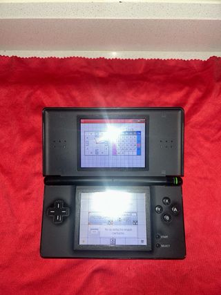 Nintendo DS Lite nera + caricabatterie | in buone condizioni