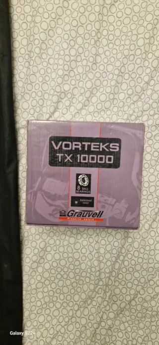 Caña de pesca con carrete