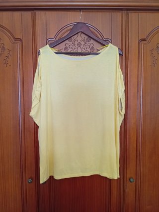 Camiseta amarilla de la marca Milano