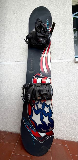 Snowboard con scarponi