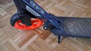 Patinete Oxelo naranja y negro