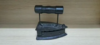 Plancha de carbón antigua