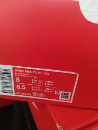 Nike Dunk High Gris y Blanco