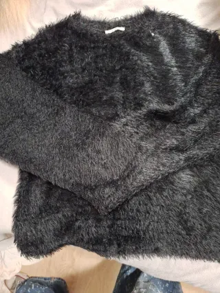 Jersey pelo negro suave manga anchita.