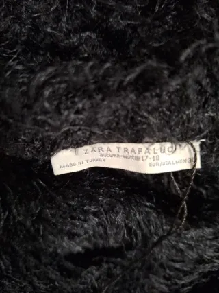 Jersey pelo negro suave manga anchita.