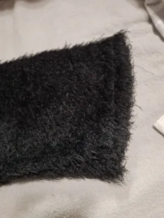 Jersey pelo negro suave manga anchita.