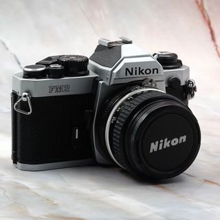 Cámara Nikon FM2 + Objetivo 50mm f/1.4