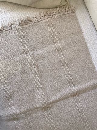 Alfombra pequeña beige