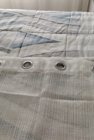 2 cortines visillo blanques