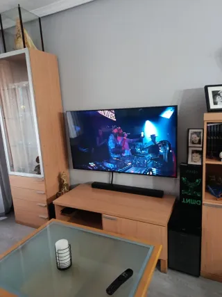 Mueble de salón madera y cristal