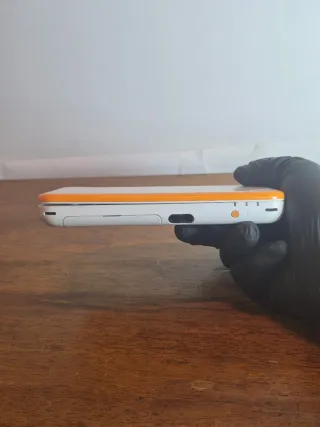 Nintendo 2DS XL Arancio/Bianco + Caricatore