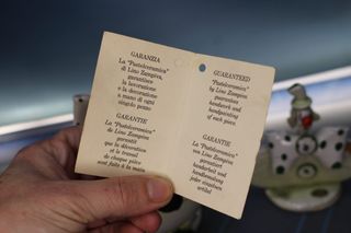 Porcelana Zampiva. Italia. Tarro y figura de payasos pelo espagueti.