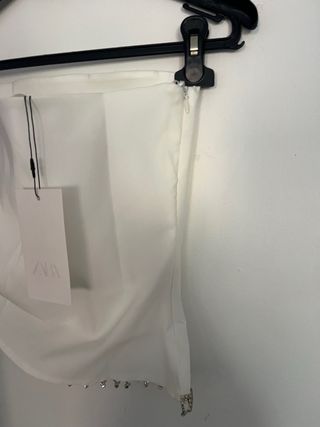 Top blanco con pedrería