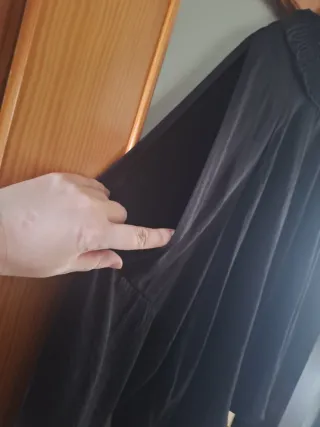 Blusa negra cuello alto talla 48