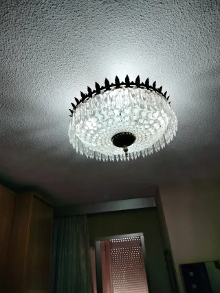 Lámpara de araña cristal y metal