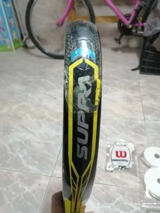 Pala de pádel NB Supra Carbon Y UNOS 70 OBERGRIPS