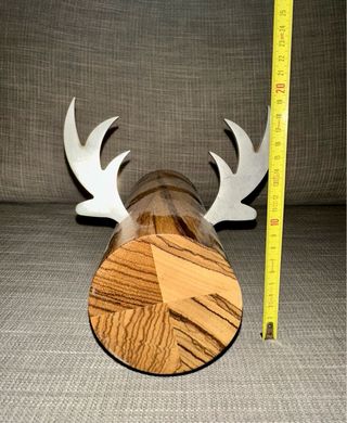 Escultura madera e hierro animal