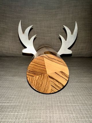 Escultura madera e hierro animal