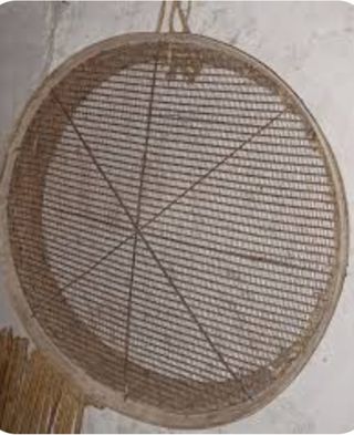 Criba de madera y metal
