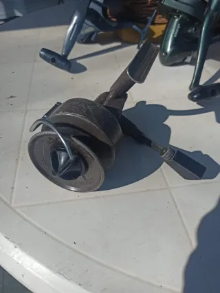 Lote carretes pesca.   (   )