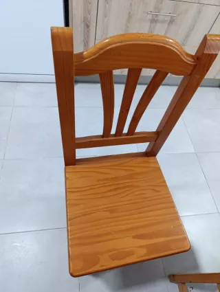 Mesa de comedor ovalada de madera y cristal