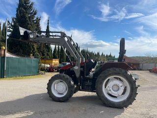 New Holland TS90 con pala frontal