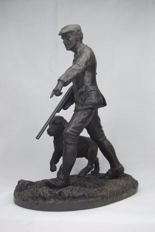 Escultura J. Bromley Cazador con Perro