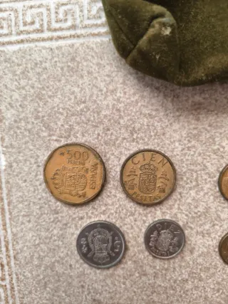 Monete antiche e portafoglio