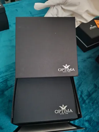 Reloj Optima Suizo Dorado Blanco Garantía