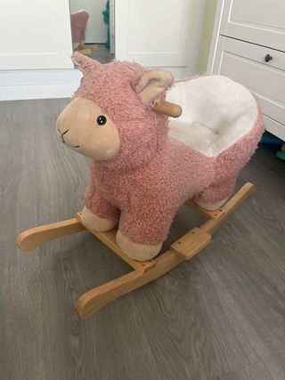 Balancín de peluche rosa para bebé