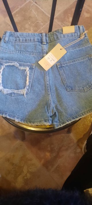 Shorts di jeans con perle e strass