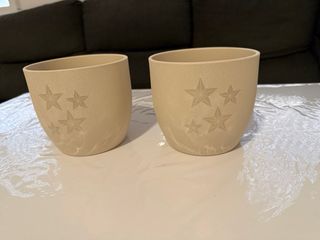 Macetas de piedra beige con estrellas 20€ cada uno