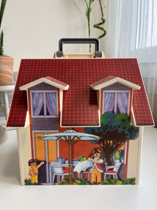 Casa Playmobil con figuras y accesorios