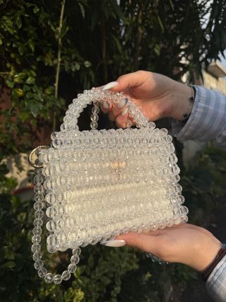 Bolso de mano perlas blanco y dorado