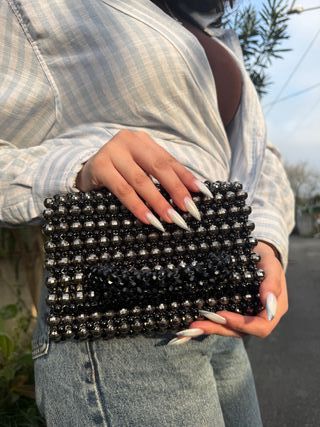 Bolso de mano perlas blanco y dorado