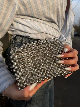 Bolso de mano perlas blanco y dorado