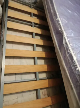 Cama nido gris y blanca prácticamente nueva.