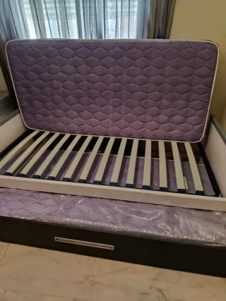 Cama nido gris y blanca prácticamente nueva.