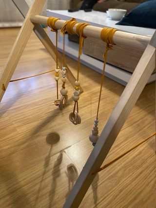 Gimnasio de madera para bebé