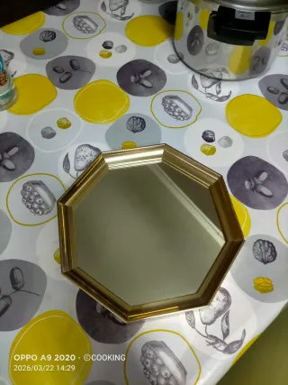 Espejo octogonal dorado